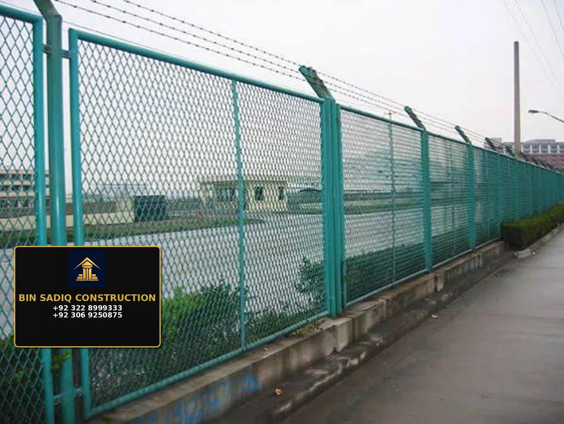 Wire mesh boundary fence Lahore with Bin Sadiq Construction board and numbers